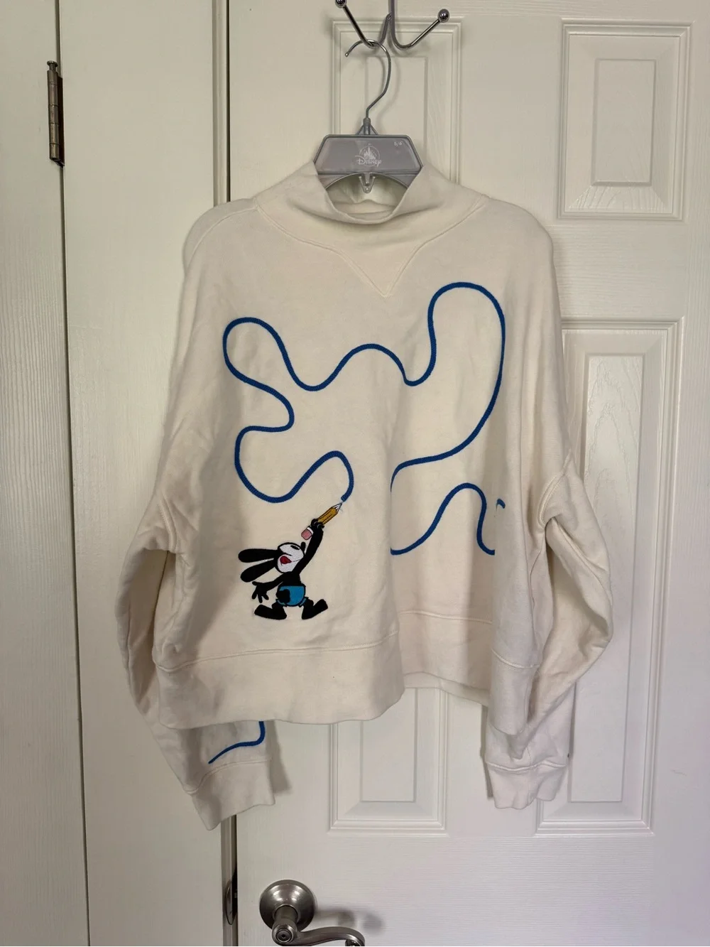 EUC Disney Parks Oswald Cowlneck Cream Sweater worn once